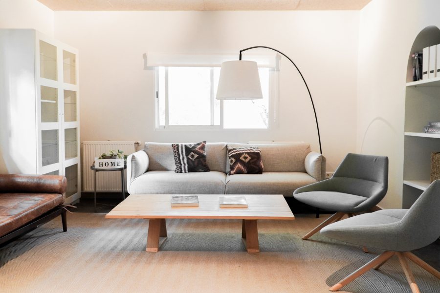 a living room of the residence with armchairs, sofas and more furniture